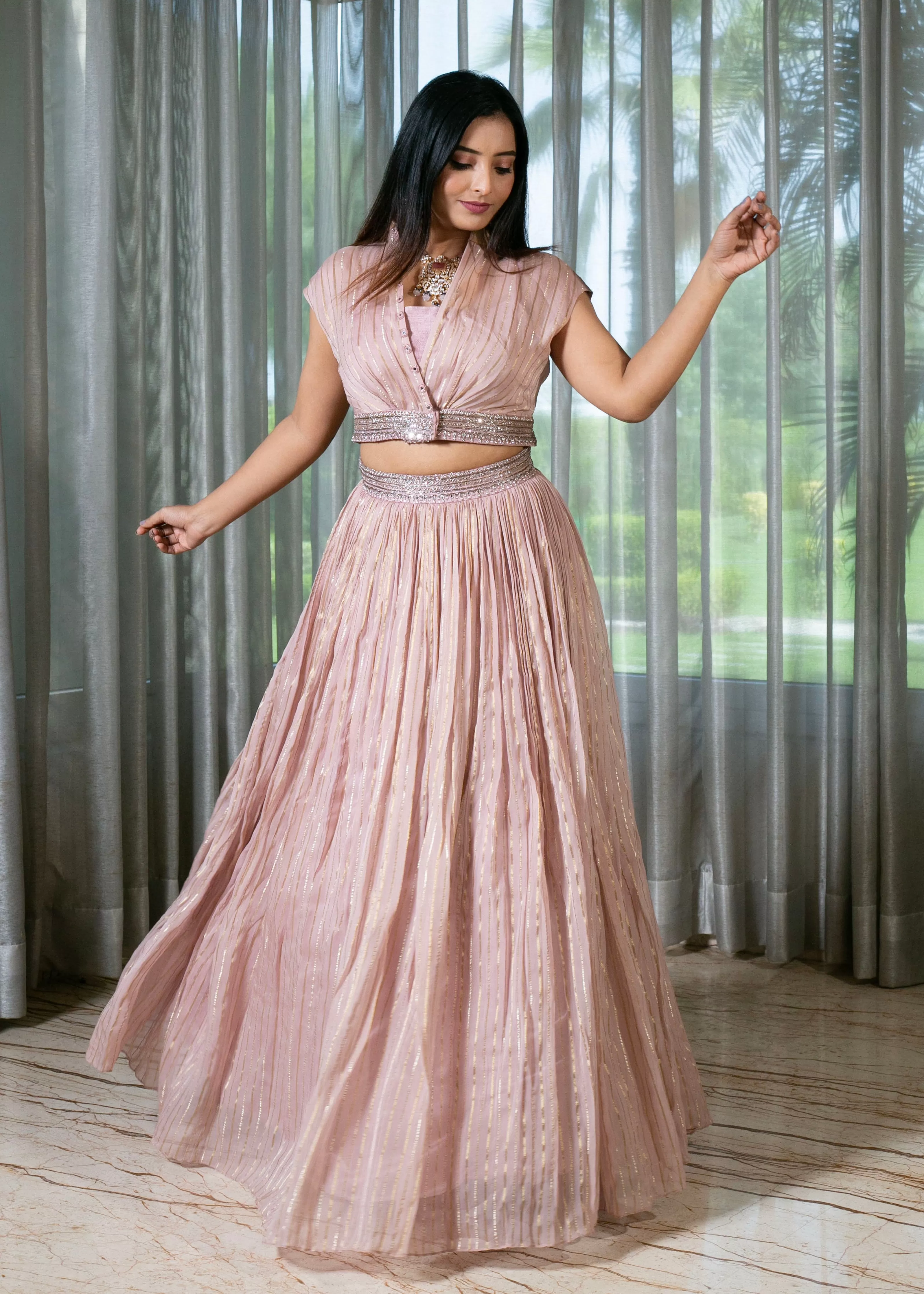 Handcrafted Light Onion Pink Lehenga Set with Gold Stripes.