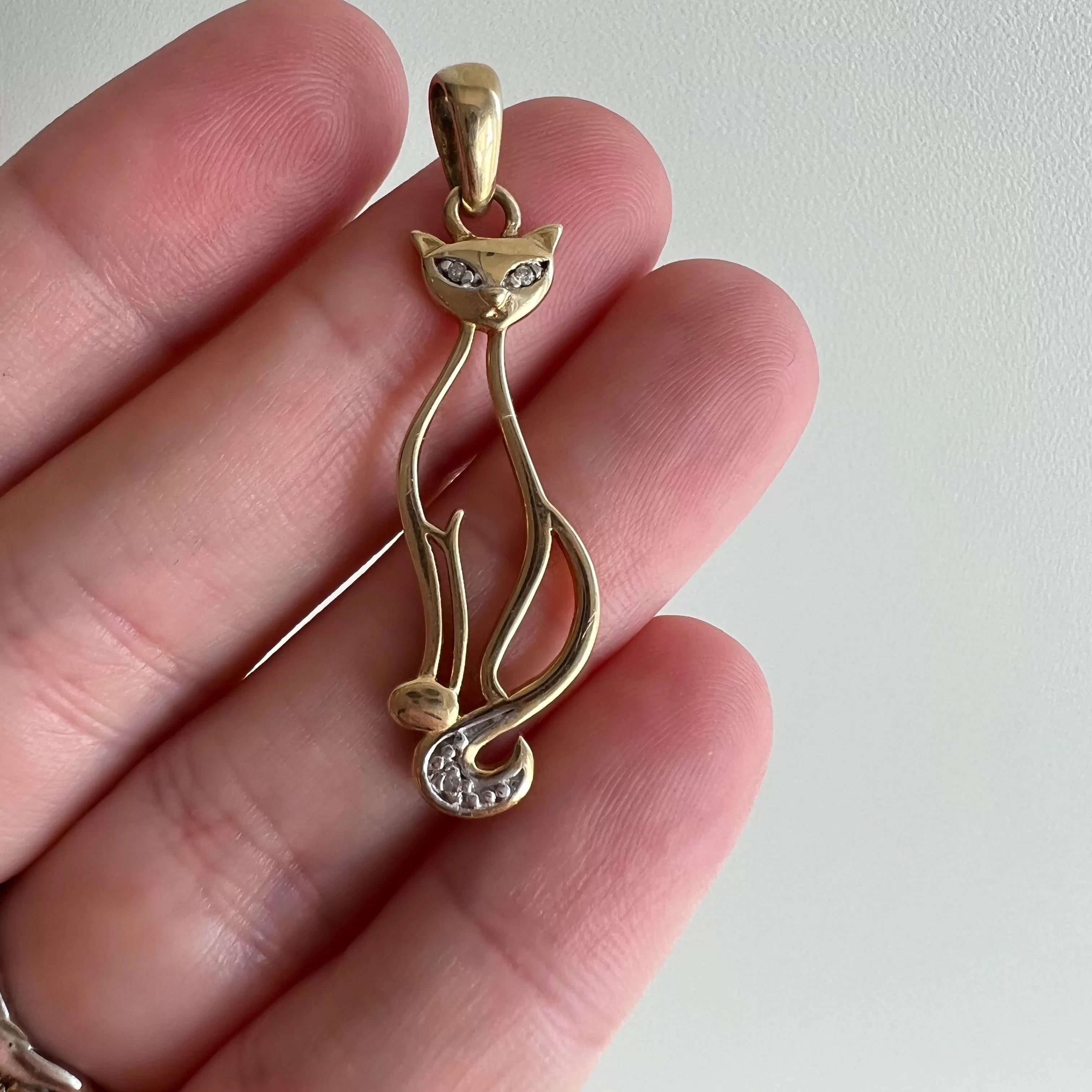 V I N T A G E // sassiest cat / 10k yellow and white gold sassy cat with diamonds / a pendant